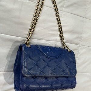 Tory Burch purse. Has some wears and tear. But great bag.